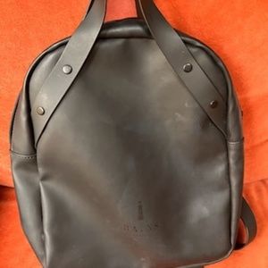 RAINS brand small backpack